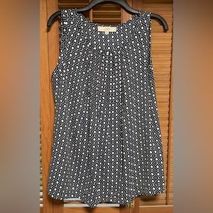 Women’s Loft blue and white patterned sleeveless blouse; size M